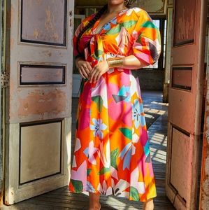Tropical bare midriff maxi dress with front tie by Eloquii